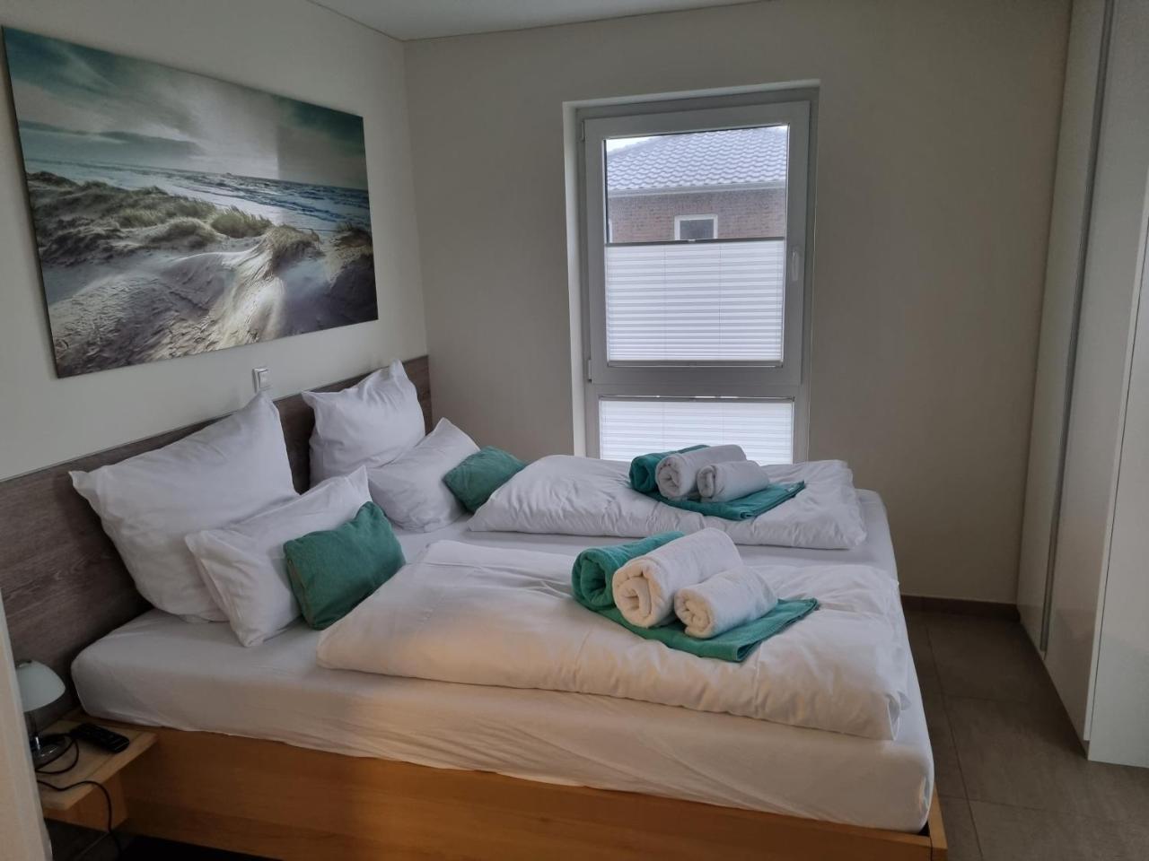 Neu Moderne Lichtdurchflutete Dhh Zentral Garten Wallbox Wlan — hotel in Butjadingen