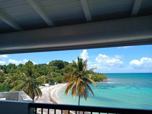 Une terrasse pleine vue mer — 4-Star Luxury Hotel in Le Gosier, Guadeloupe