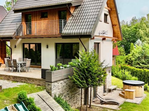 Mazursko komfortowe domy 8 osobowe nad jeziorem balia lub sauna in Ostroda, Poland