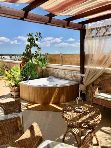 No Vabbè Penthouse — 4-Star Luxury Hotel in Torre Santa Susanna, Italy