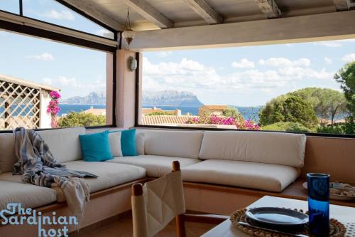Tavolara House family relax — 4-Star Luxury Hotel in Golfo Aranci, Italy