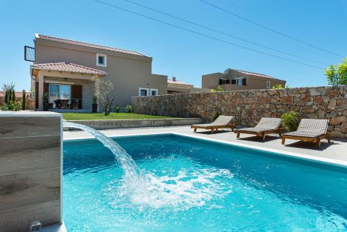 New luxury villa with swimming pool sauna near beach by Traveler tourist agency Krk ID 2380 br 4 — 4-Star Luxury Hotel in Privlaka, Croatia
