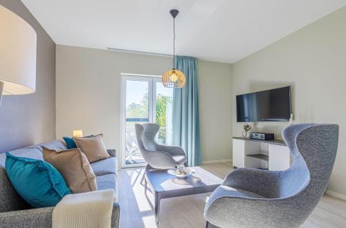 Achterndieck Modernes 5 Sterne Erdgeschoss Apartment mit Balkon — 4-Star Luxury Hotel in Wustrow, Germany