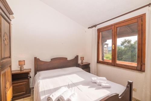 Trilocale Vista Mare e Giardino B — 4-Star Luxury Hotel in Palau, Italy