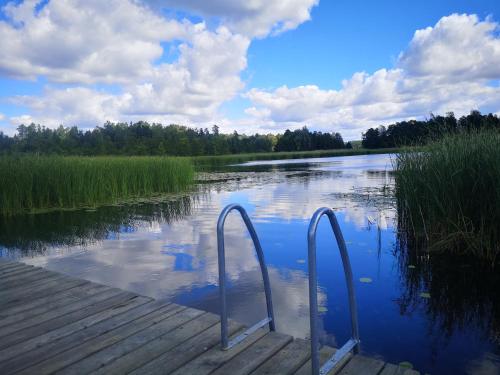 Dom nad jeziorem z prywatnym pomostem i linią brzegową in Orzysz, Poland