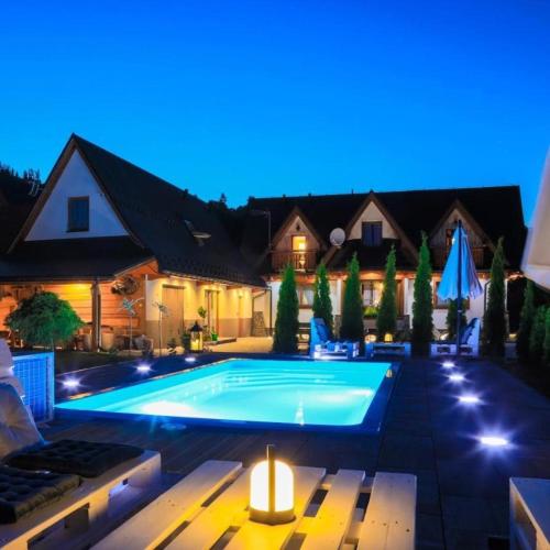 Domki Dream House Resort 606 436 626 in Poronin, Poland