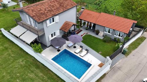 Holiday house with a swimming pool Lucane Zagora 23648 — 4-Star Luxury Hotel in Sinj, Croatia