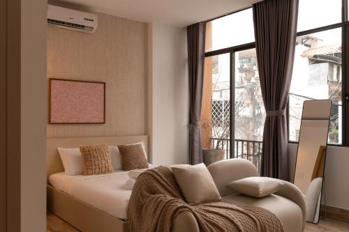 HihiVillage Serviced Apartment Elevator by SSens Homes — 4-Star Luxury Hotel in Ho Chi Minh City, Vietnam