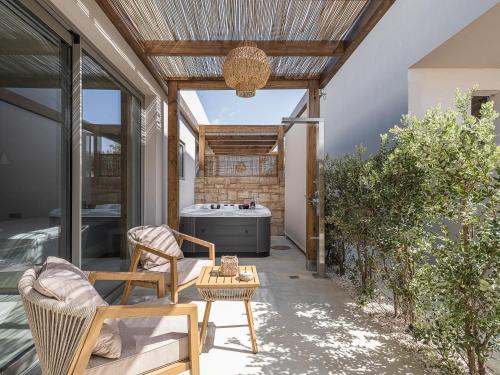 Vanilla Suites with Hot Tub — 4-Star Luxury Hotel in Ayioi Apostoloi, Greece