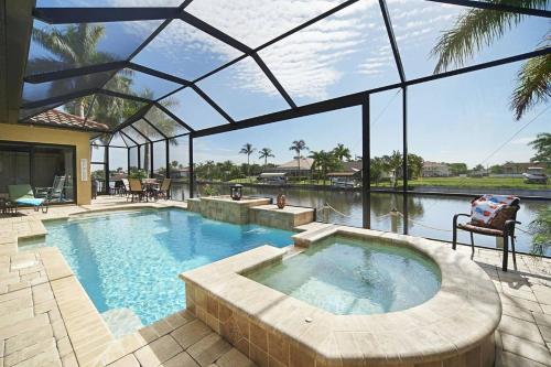 Summer discounts Stunning Gulf access home with saltwater heated pool & spa Villa Francesca — 4-Star Luxury Hotel in Cape Coral, United States