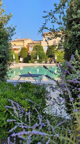 Family Garden Apartment Borgo dei Fiori — 4-Star Luxury Hotel in Lido Di Jesolo, Italy