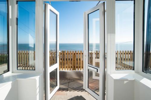 Abalyne Beach House Stunning 4 bedroom beach house Sea views throughout modern and bright house