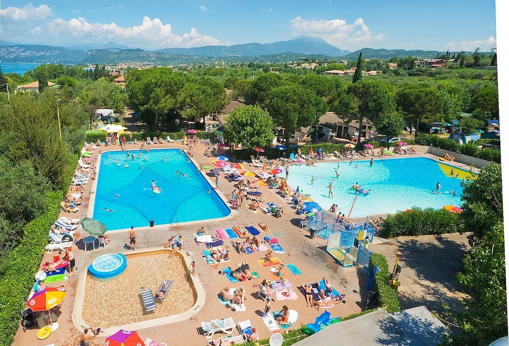 Happy Camp in Camping Cisano San Vito — 4-Star Luxury Hotel in Bardolino, Italy