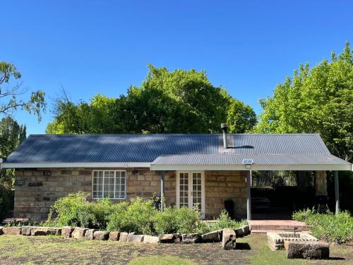 Periwinkle Grove Acorn & Sage Cottages — 4-Star Luxury Hotel in Clarens, South Africa
