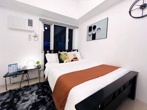 1BR Condotel with Balcony at SM Light Residences #LT01 — 4-Star Luxury Hotel in Manila, Philippines