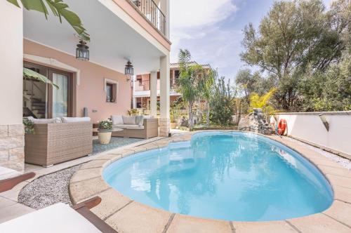 GuestHost Stunning Villa Paola with Swimming Pool & Terrace — 4-Star Luxury Hotel in Villasimius, Italy