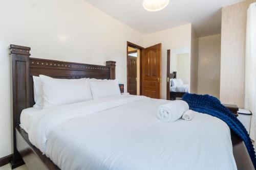 Serenity Retreat 2 Bed Apartment with Pool & Gym