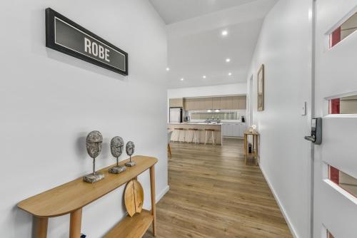 Bright & Easy Address is 7 Cobb & C Way Pet Friendly Inside — Robe — photo 4