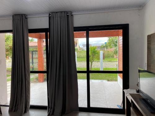 Casas de Veraneio em Torres com Terreno Compartilhado Frontal in Torres, Brasil