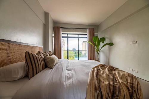 Modern Living 2 Br Near Yaya Gym & Pool