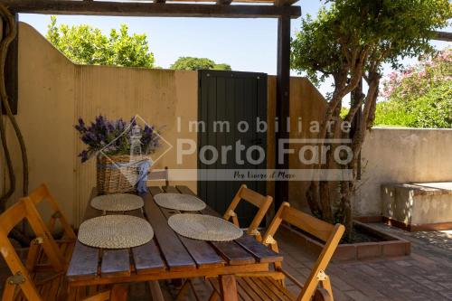 35 FARO Spazioso trilocale sulla spiaggia di Porto Faro — 4-Star Luxury Hotel in Palau, Italy
