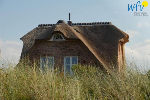 Landhaus Ostdüne Ferienwohnung Dünenmulde — 4-Star Luxury Hotel in Juist, Germany