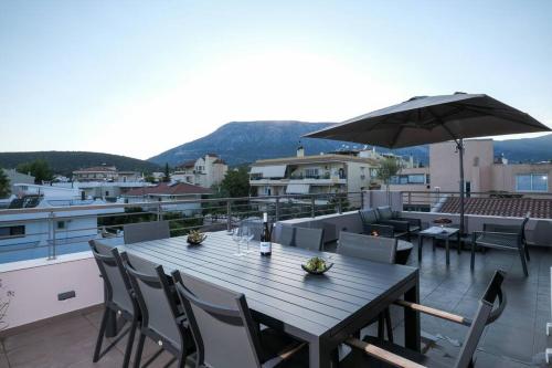 Spacious & Minimal Apartment Near Airport Peania Coniann Filoxenia — 4-Star Luxury Hotel in Paiania, Greece
