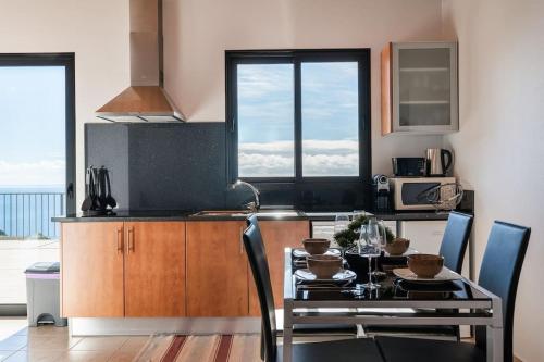 Marina View Apartment Pool & stunning ocean view — 4-Star Luxury Hotel in Calheta, Portugal