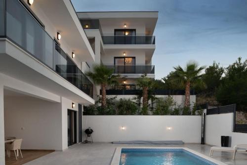 NEW Villa Palm Bay 1 & 2 with two heated pool near sea — 4-Star Luxury Hotel in Rogoznica, Croatia