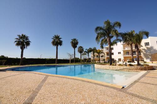Sea and Pool at Vila da Praia — 4-Star Luxury Hotel in Alvor, Portugal
