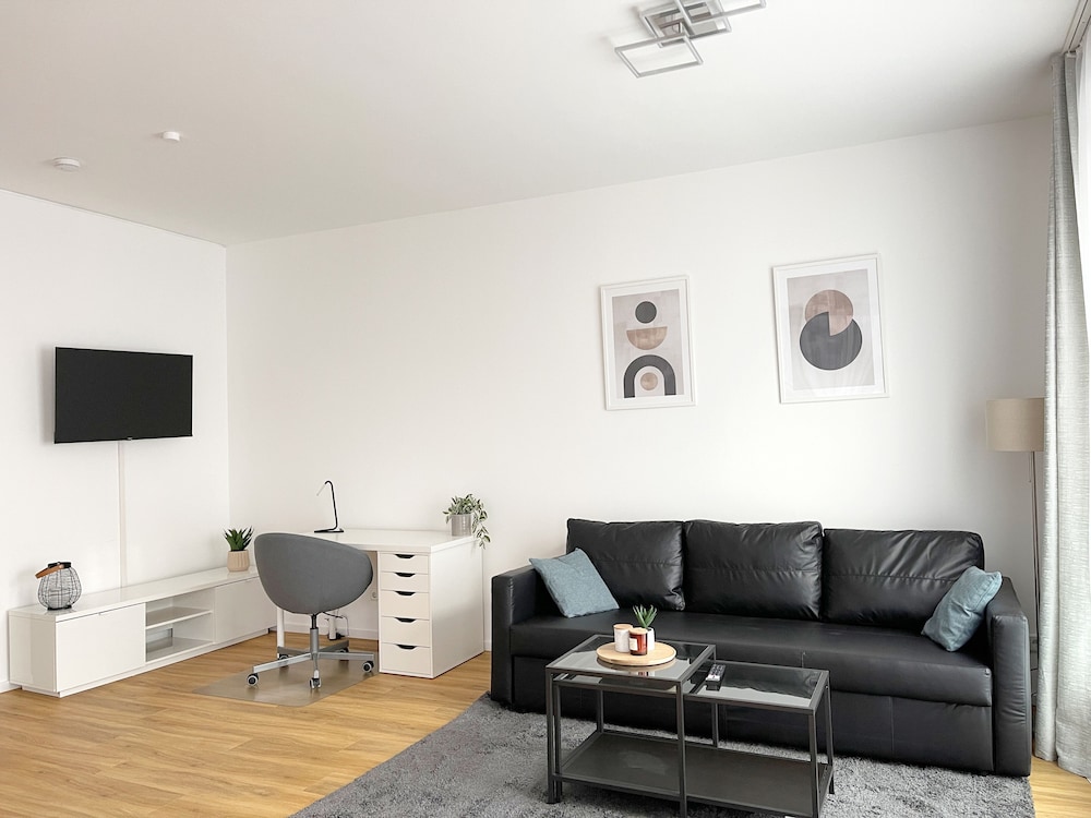 Moderne Apartments im Herzen der Stadt I private Tiefgarage mit Ladesäulen I home2share — 4-Star Luxury Hotel in Ibbenbueren, Germany