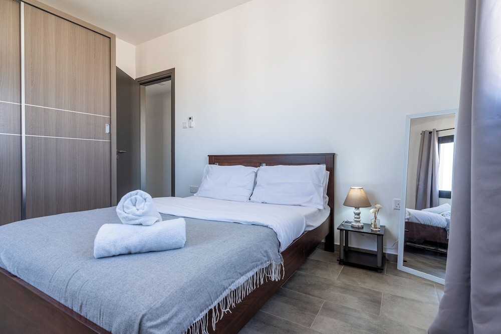 Maryam’s 2 BR Apt Facing Larnaca Harbor With Pool