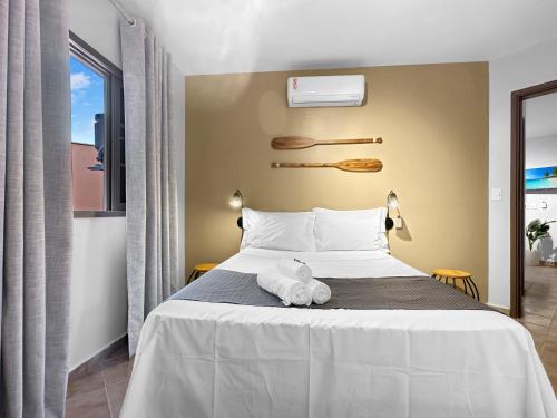 2 quartos 200m do mar Jacuzzi AC Churrasqueira in Guaruja, Brasil