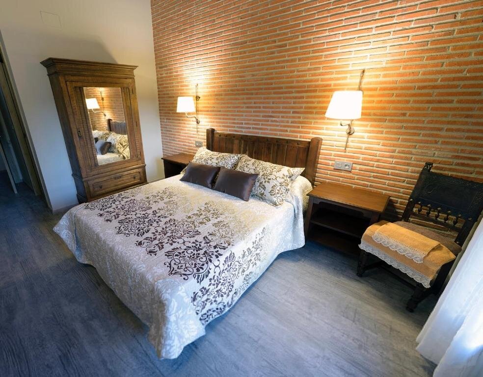 Casa Rural La Puerta Del Rio Lobos 10900585 — San Leonardo De Yague