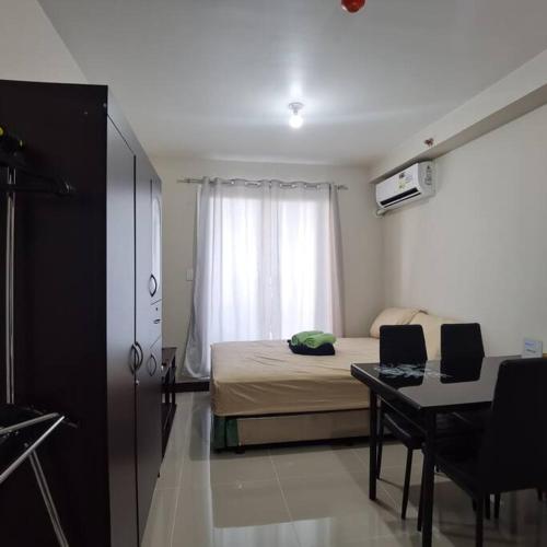 Affordable Condo w Wi Fi Pool & Shower Heater — 4-Star Luxury Hotel in Lapu-Lapu City, Philippines