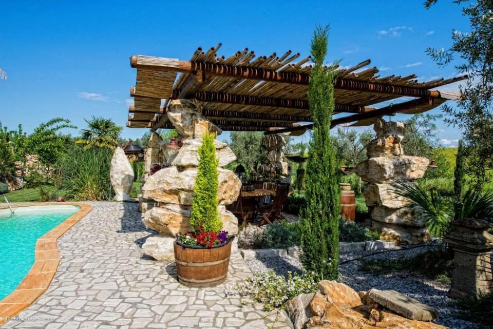 Il Giardino dei Flintstones B&B — 4-Star Luxury Hotel in Cerveteri, Italy