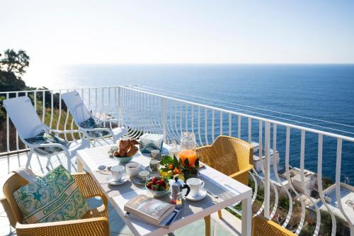 Sea Whisper Home Sunset Sea Easy Stay Shops — 4-Star Luxury Hotel in Praiano, Italy