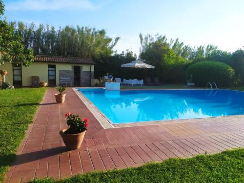 Guest Garden Apartment Casale Salici Baratti — 4-Star Luxury Hotel in Campiglia Marittima, Italy