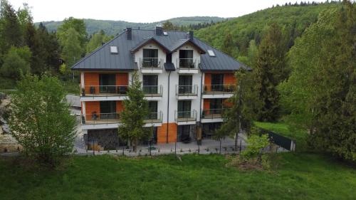 Apartamenty Trzy Kopce Ski & Bike & Sauna — 4-Star Luxury Hotel in Ustron, Poland