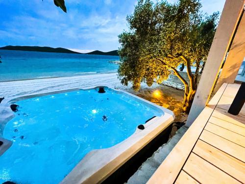 Buqez Eco Resort Beach Villa 81 1St Sea Line By Beach in Pakostane, Croatia