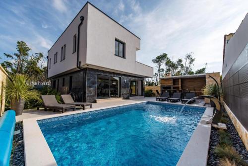 Villa Lisa by Belmont Realty — 4-Star Luxury Hotel in Privlaka, Croatia
