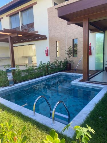 Lindo Village 3 suítes Imbassaí in Mata De Sao Joao, Brasil