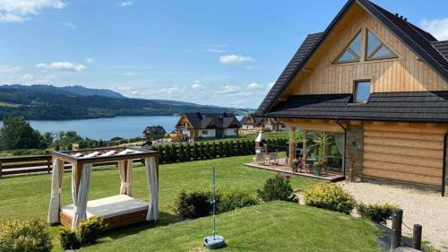 Całoroczne domki Pasja II View Lake & Ski — 4-Star Luxury Hotel in Kluszkowce, Poland