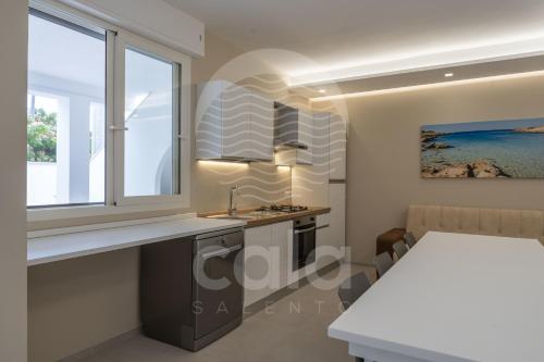 Villetta Alba spiaggia a 13 m By Cala Salento in Porto Cesareo, Italy