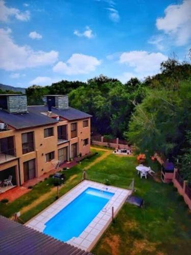 Departamento con pileta y asadores — 4-Star Luxury Hotel in Villa General Belgrano, Argentina