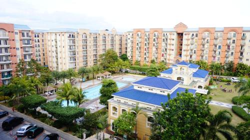 1BR with Balcony Overlooking Pool Chateau Elysee Near NAIA — 4-Star Luxury Hotel in Manila, Philippines