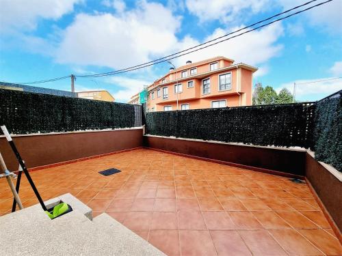 Apartamento con terraza y piscina — 4-Star Luxury Hotel in Ribeira, Spain