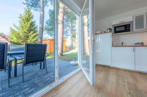 Merlin Nest Komfortable Wohnung mit Terrasse Garten & Infrarotkabine — 4-Star Luxury Hotel in Marienfelde, Germany