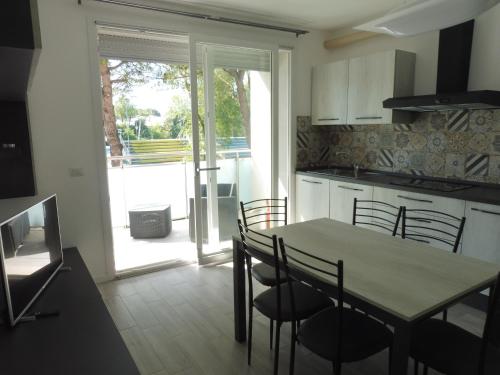 Residence Caorle App. n. 5 — 4-Star Luxury Hotel in Caorle, Italy