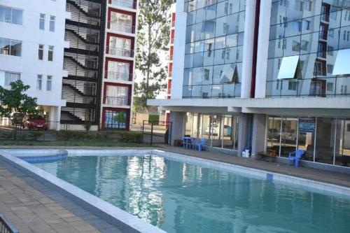 Delightful Studio Racecourse Gardens Apt with pool
